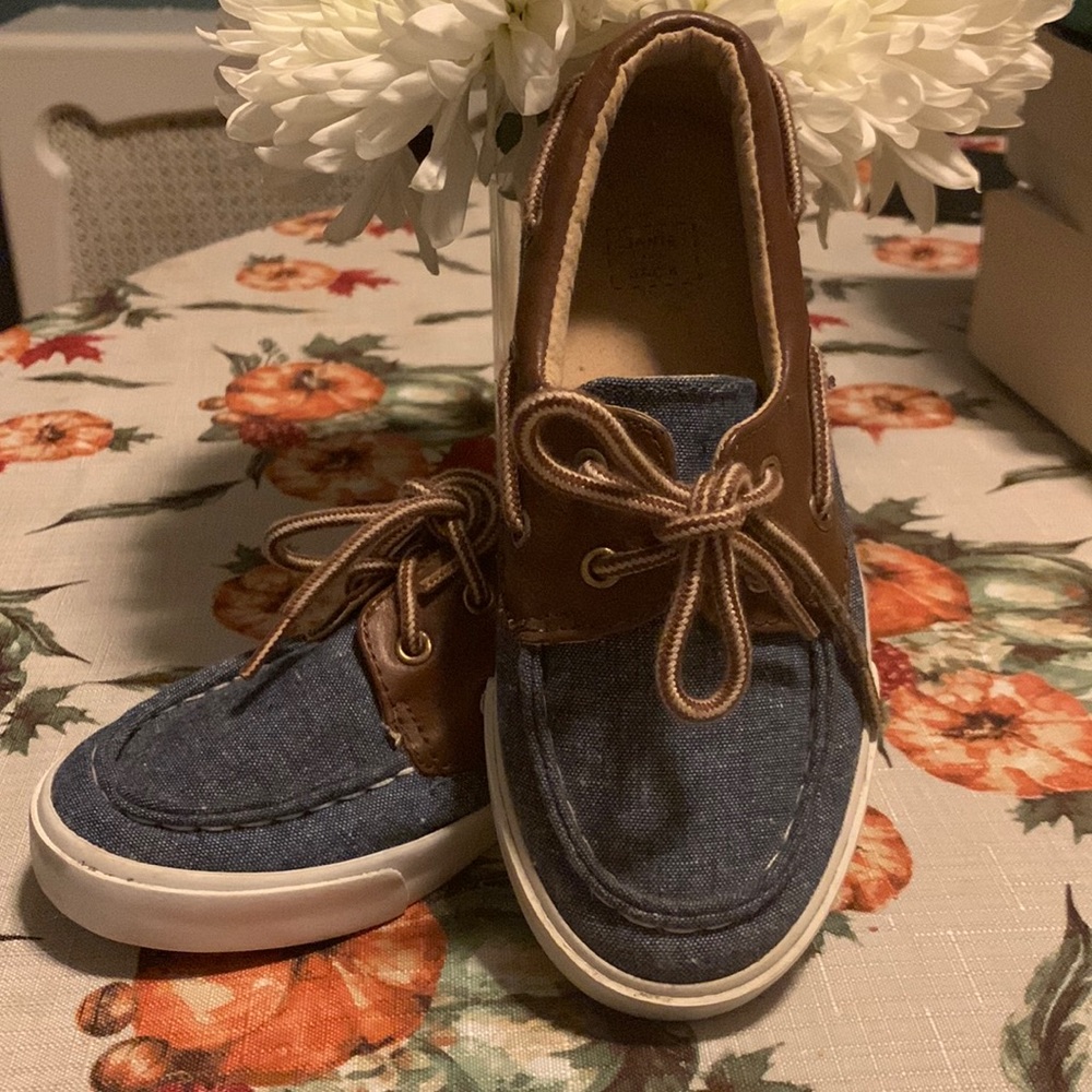 Size 11.  Lace up boat shoes Denim and leather fabric.